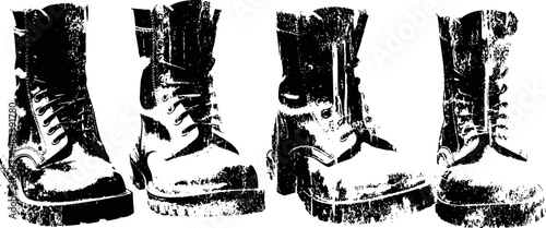 Black leather combat boots in various sizes with rugged soles and laces standing against white background