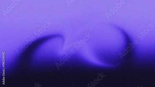 a blurry image of a purple background with a dark object