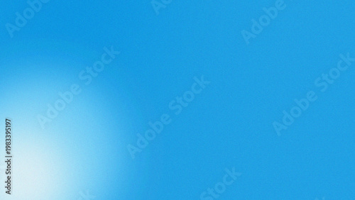 a bright white spot in a blue sky