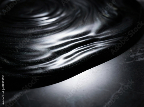 Glossy oil flowing over dark marble surface, creating smooth ripples and reflections in luxury style. Concept of environmental pollution, marine life threat, oil spills, ecological crisis