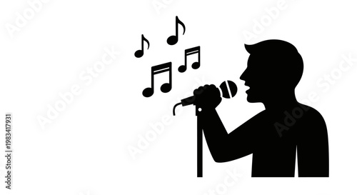 Silhouette of a man singing into microphone.