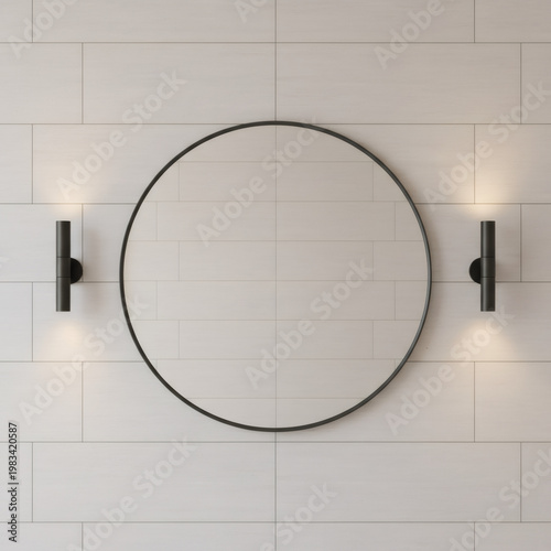 Round mirror with black frame hanging on white tiled wall between two modern wall lamps. Minimalist bathroom interior design. Contemporary home decor concept for luxury apartment style.
