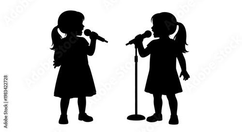Two young girls singing into microphones.