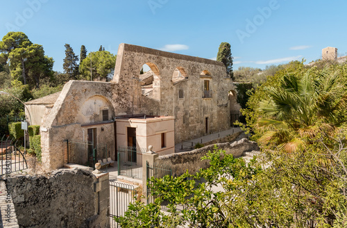 Wallpaper Mural Ruins of the Temple of Apollo inside the Neapolis Archaeological Park in Syracuse, Sicily, Italy. Torontodigital.ca