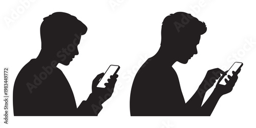 Silhouettes of two men looking at their smartphones