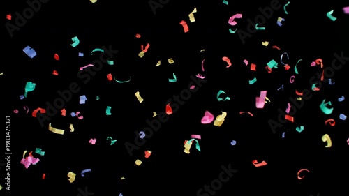 Super slow motion of flying confetti isolated on black background. Filmed on high speed cinema camera