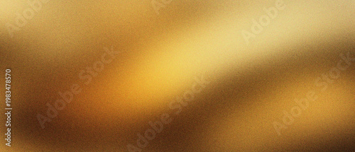 Golden abstract background with grainy texture and soft light leaks. Warm amber gradient backdrop with film grain effect. Elegant metallic glow for luxury branding, web design, and social media.