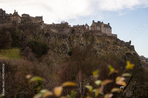 Edinburgh Castle Perched on Volcanic Rock with Foreground Foliage