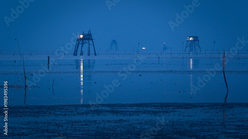 Photos Watch tower on the oyster farm under twilight moment in Go Cong Dong, Tien Giang