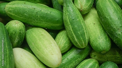 Close-up of fresh green cucumbers at a local market