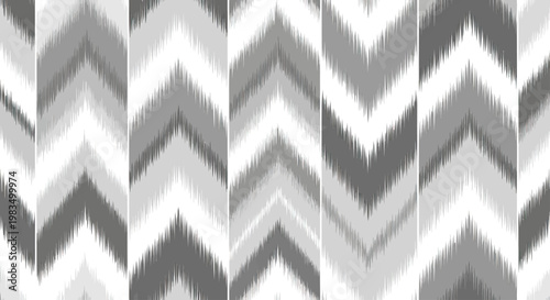Vertical chevron pattern with varying shades of grey and white