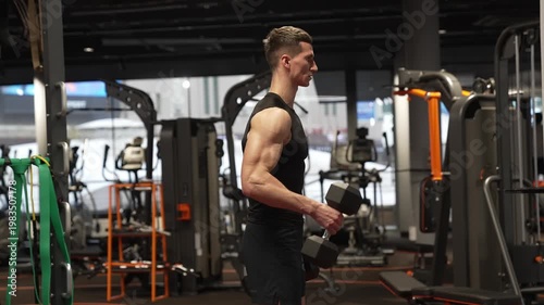 Healthy lifestyle. Gym arm training. Strong triceps. Man exercising with dumbbell. Man athlete lifting dumbbell. Strong man do sport exercise. Gym workout. Sport athlete man with dumbbell