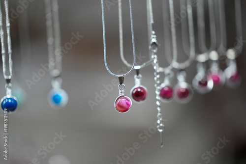 many necklages hanging jewelry detail