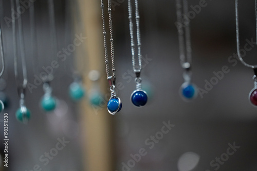 many necklages hanging jewelry detail