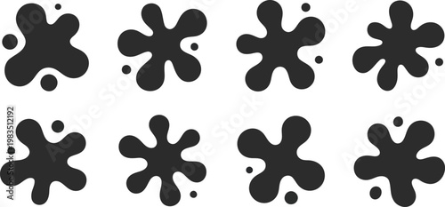 Abstract black splatter shapes a collection of organic ink blot patterns