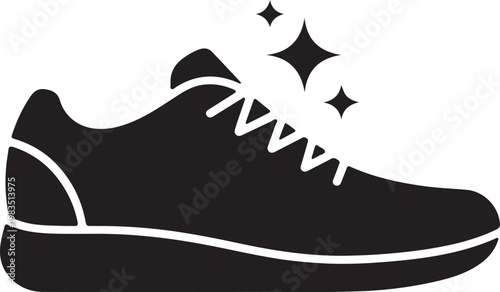 Elegant classic black leather oxford shoe with shining polish and brush for shoe care. Polished Footwear Shine Symbol