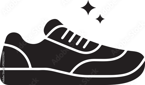 Elegant classic black leather oxford shoe with shining polish and brush for shoe care. Polished Footwear Shine Symbol