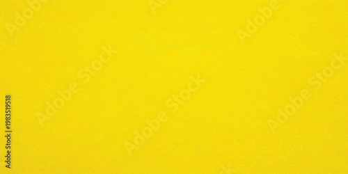 Bright yellow construction paper texture background with fine grain. Vibrant sunny surface for school projects, creative crafts, and posters.