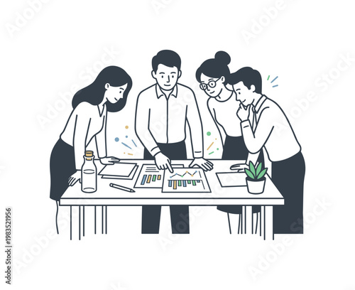 Colleagues gathered around a simple desk reviewing charts with one central person pointing at printed graphs while others lean in