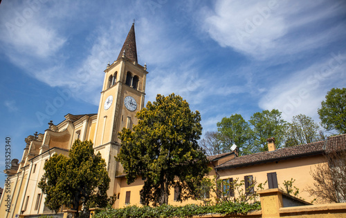 Historic Church with Steeple and Clock Tower in a European Village