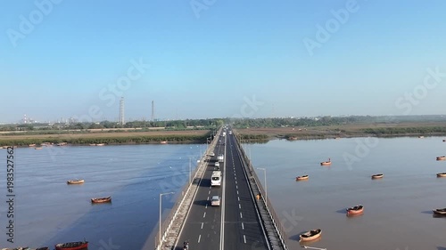 Top view of highway bridge crossing Tapi River with traffic movement in Surat Gujarat India