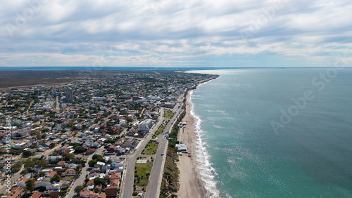 Aerial panoramic view of Las Grutas coastal city and the Atlantic Ocean.