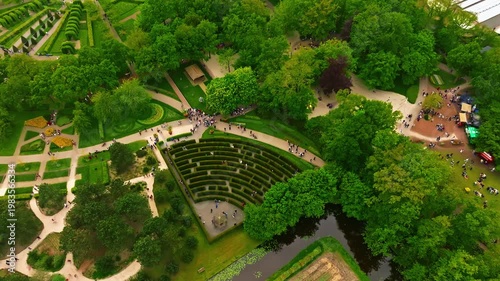 Aerial view of famous Keukenhof windmill. Colorful tulips on sunny day at the Keukenhof flower garden, Lisse, The Netherlands