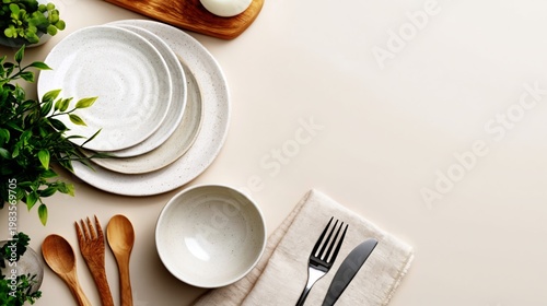 Clean Kitchen Table With Empty Plates and Bowls Ready for Meal Preparation