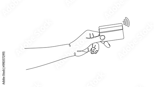 Hand holding a contactless payment card.