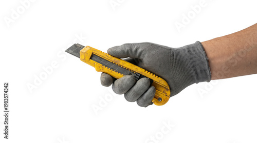Hand holding a yellow utility knife or box cutter for crafting and work. Isolated on transparent background, png
