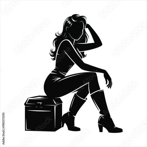 Woman sitting on trunk wearing boots and elegant outfit