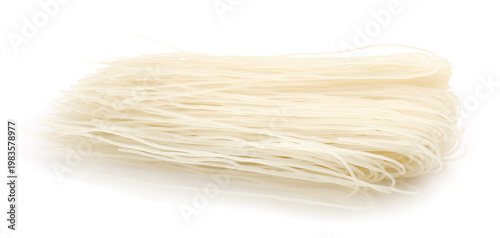 Foto Uncooked rice noodles isolated on white. East Asian cuisine