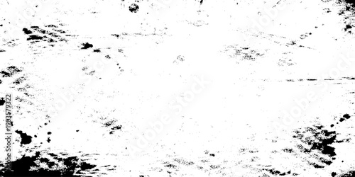Abstract black and white grunge texture background with heavy ink splatters, weathered distressed surface for overlay effects, industrial vintage grainy wall with scratched details and high contrast.
