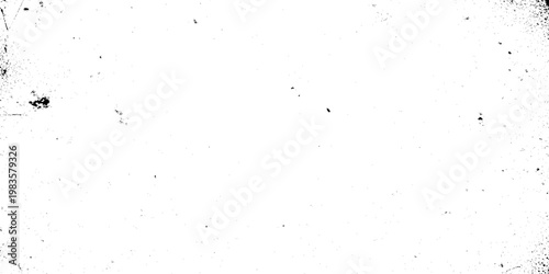 Abstract black and white grunge texture background with heavy ink splatters, weathered distressed surface for overlay effects, industrial vintage grainy wall with scratched details and high contrast.