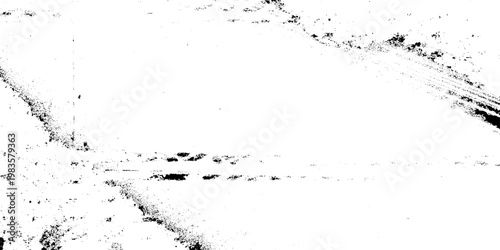 Abstract black and white grunge texture background with heavy ink splatters, weathered distressed surface for overlay effects, industrial vintage grainy wall with scratched details and high contrast.