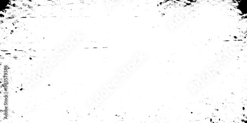 Abstract black and white grunge texture background with heavy ink splatters, weathered distressed surface for overlay effects, industrial vintage grainy wall with scratched details and high contrast.