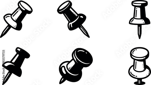 Push pins set in different angles on white background