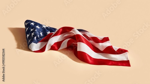 Waving Fabric With Stars and Stripes Resting on a Plain Background Showing Na...