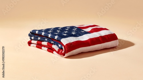 Waving Fabric With Stars and Stripes Resting on a Plain Background Showing Na...