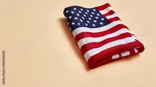 Flag of the United States Folded on a Light Background Showing Red, White, an...