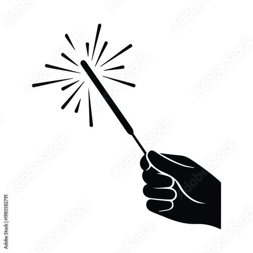 Hand holding burning sparkler stick with glowing fire sparks for celebration and festivals