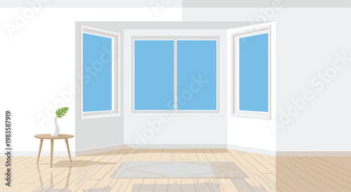 An empty sunlit room showcases a large three-pane bay window overlooking a blue sky with a small wooden side table and grey geometric rug on the floor.