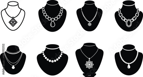 Elegant jewelry collection display necklaces on black bust forms a stylish presentation