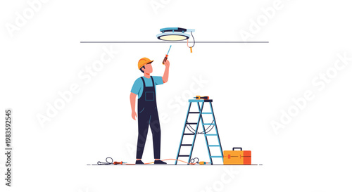 A professional electrician wearing a protective yellow hard hat and blue overalls uses a screwdriver to install a modern ceiling light fixture indoors.