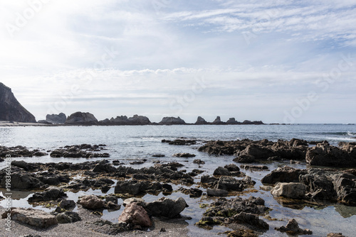 Gueirúa beach coastline with unique rock formations and sea