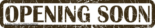 Rectangular rubber stamp with distressed brown text reading opening soon grunge texture