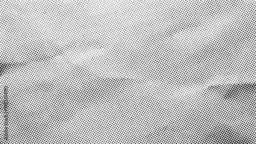 Halftone pattern texture on white paper background. Black grunge dot gradient design element for graphic work. Abstract geometric transition effect in offset print style illustration.
