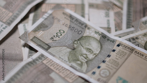 Pile of Indian Five Hundred Rupee Currency Notes on a Flat Surface. Scattered Indian Paper Currency Representing Wealth Investment and Economy. Indian Currency for Business and Banking Background.