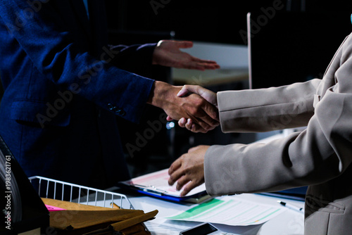 Tableau sur toile Business people shaking hands after closing a deal in lawyers office