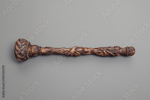 Brown twisted rope coil with frayed ends on white background